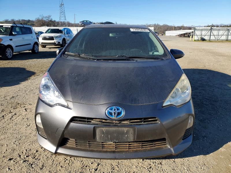 Photo 5 from auction – 2014 TOYOTA PRIUS C with VIN JTDKDTB31E1558091