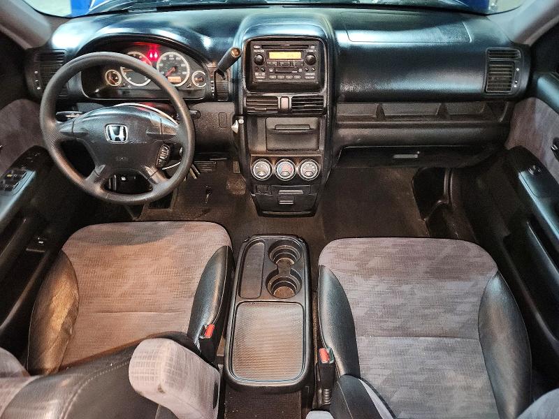 Photo 8 from auction – 2004 HONDA CR-V LX with VIN JHLRD68454C016904