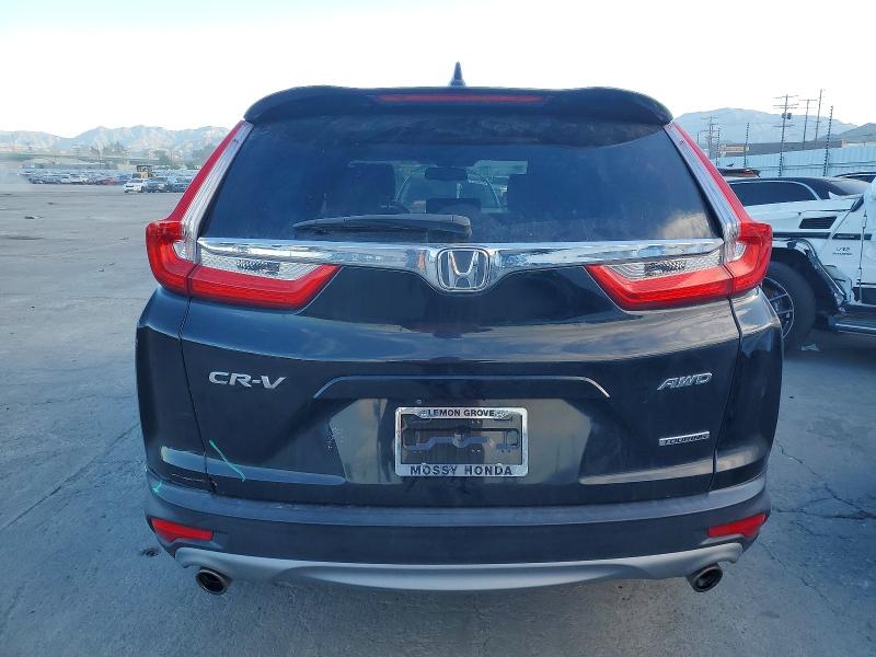 Photo 6 from auction – 2019 HONDA CR-V TOURI with VIN JHLRW2H92KX005587