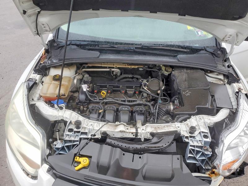 Photo 11 from auction – 2014 FORD FOCUS with VIN 1FADP3E20EL215060