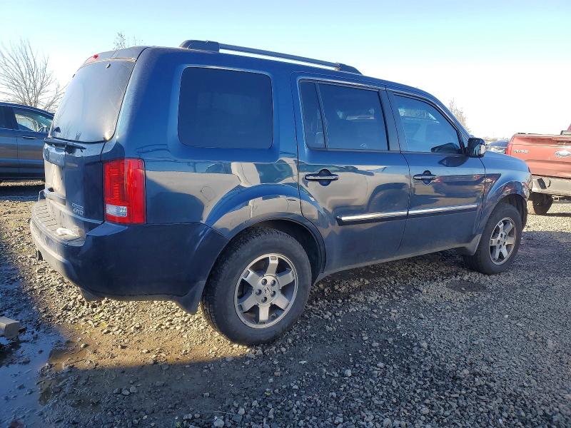Photo 3 from auction – 2010 HONDA PILOT TOUR with VIN 5FNYF4H85AB025353