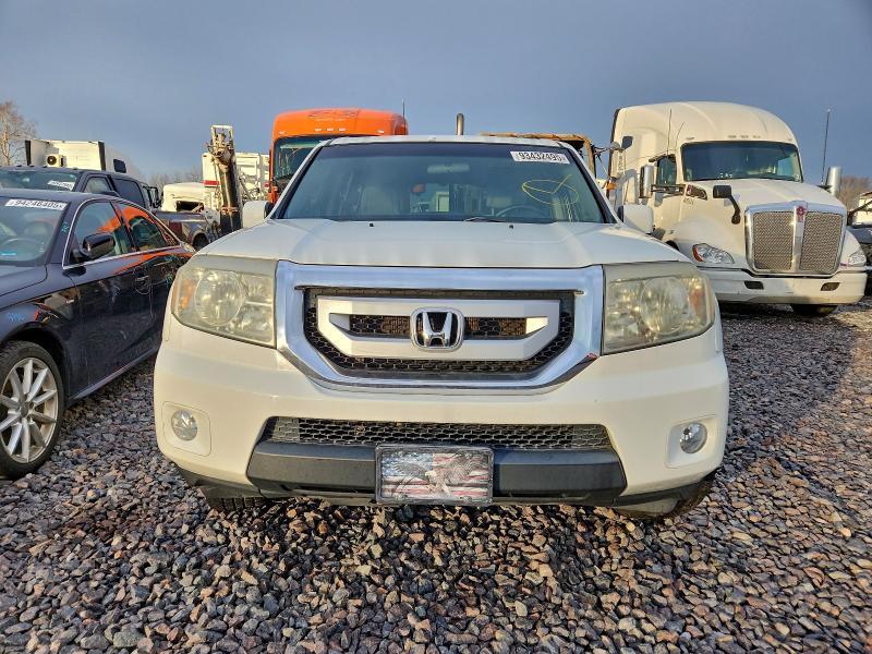 Photo 5 from auction – 2011 HONDA PILOT EX with VIN 5FNYF4H43BB067602