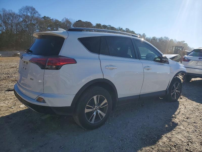Photo 3 from auction – 2017 TOYOTA RAV4 XLE with VIN 2T3WFREV4HW382932