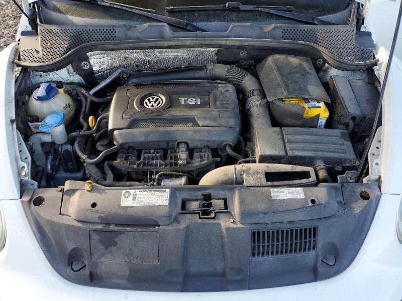 Photo 11 from auction – 2015 VOLKSWAGEN BEETLE with VIN 3VWF17AT5FM610326
