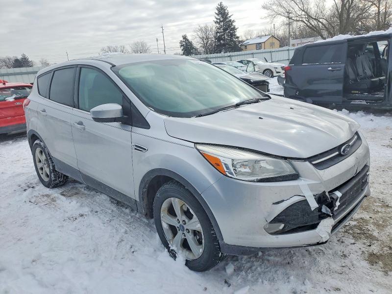 Foto 4 de la subasta – 2014 FORD ESCAPE SE con VIN 1FMCU0G97EUB43254