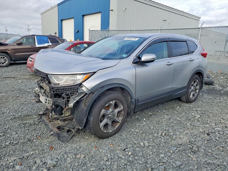 HONDA CR-V 2018 with VIN 2HKRW2H53JH115276 - Photo from auction