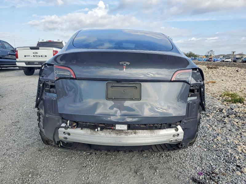 Photo 6 from auction – 2023 TESLA MODEL Y with VIN 7SAYGDEEXPF591463
