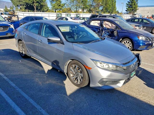 Photo 4 from auction – 2016 HONDA CIVIC EX with VIN 19XFC2F73GE209199