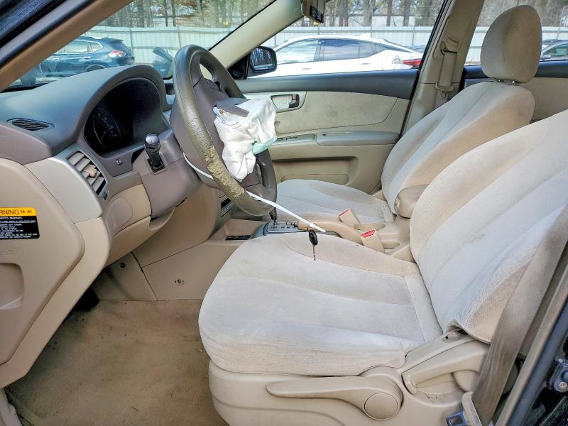 Photo 7 from auction – 2006 KIA OPTIMA LX with VIN KNAGE124165033507
