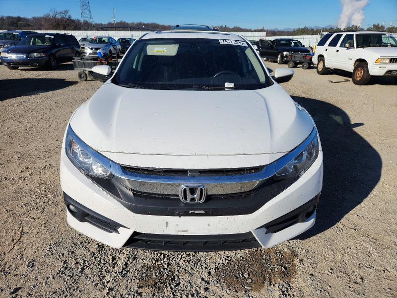 Photo 5 from auction – 2018 HONDA CIVIC with VIN JHMFC1F33JX008187