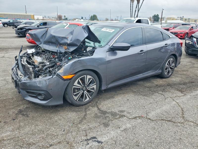 HONDA CIVIC 2016 with VIN 2HGFC1F36GH632386 - Photo from auction