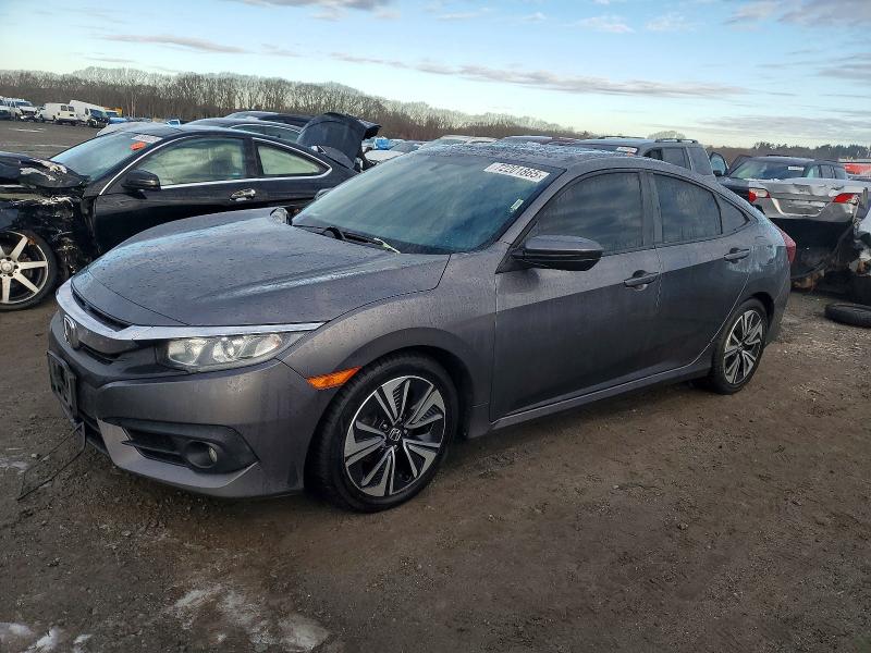 Photo 1 from auction – 2018 HONDA CIVIC with VIN JHMFC1F72JX000312