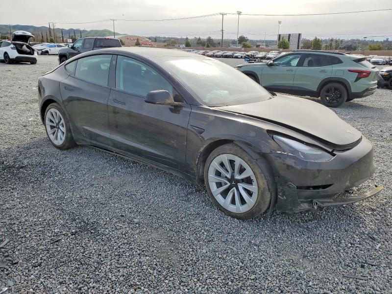 Photo 4 from auction – 2022 TESLA MODEL 3 with VIN 5YJ3E1EB8NF156004