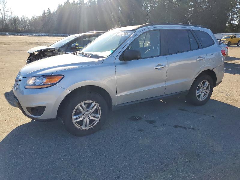 HYUNDAI SANTA FE G 2010 with VIN 5NMSGDAB9AH366570 - Photo from auction