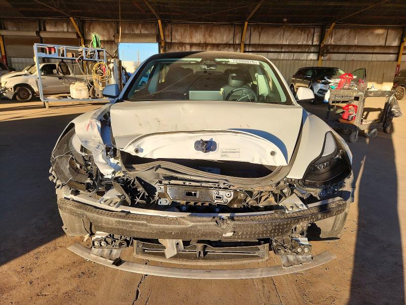 Photo 5 from auction – 2023 TESLA MODEL 3 with VIN 5YJ3E1EA8PF463103