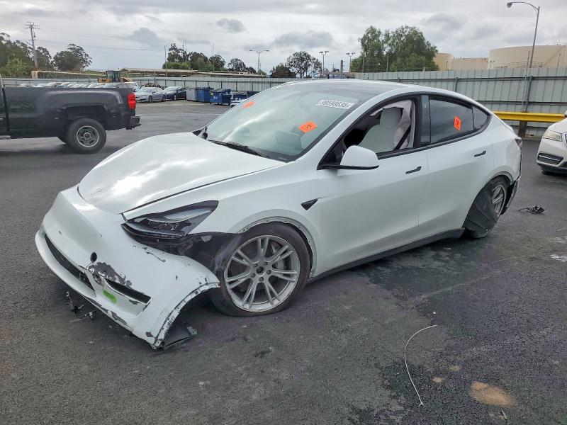 TESLA MODEL Y 2023 с VIN 7SAYGDEE3PF627137 - Фото с аукциона