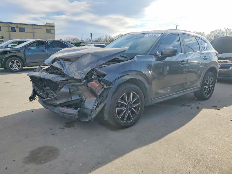 MAZDA CX-5 TOURI 2018 with VIN JM3KFACM6J1348660 - Photo from auction