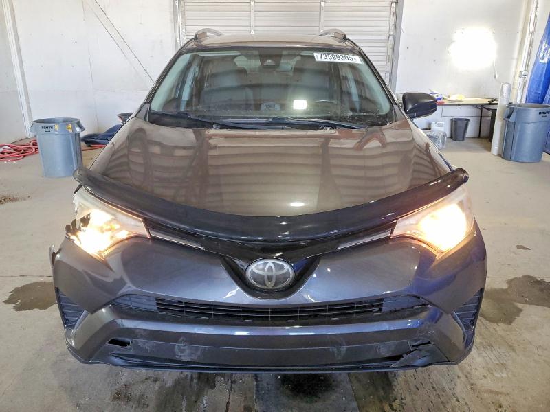 Photo 5 from auction – 2018 TOYOTA RAV4 LE with VIN JTMBFREV7JJ214429