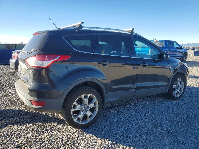 Photo 3 from auction – 2014 FORD ESCAPE with VIN 1FMCU9JX8EUB49639