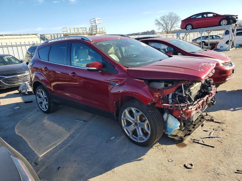 Photo 4 from auction – 2017 FORD ESCAPE TIT with VIN 1FMCU9J99HUD11008