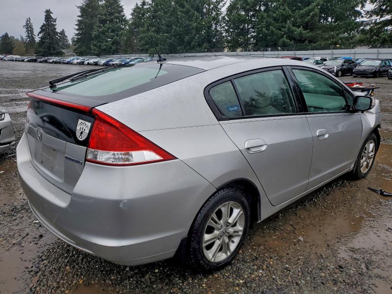 Photo 3 from auction – 2010 HONDA INSIGHT EX with VIN JHMZE2H78AS023312