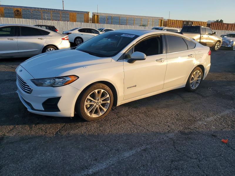FORD FUSION 2019 with VIN 3FA6P0LU5KR117523 - Photo from auction