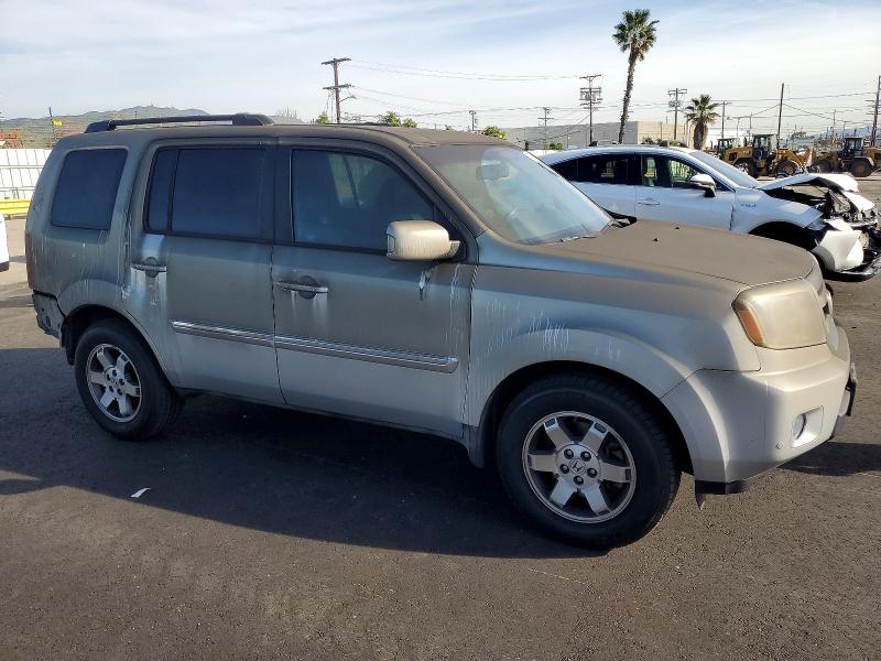 Photo 4 from auction – 2011 HONDA PILOT TOUR with VIN 5FNYF4H90BB062644