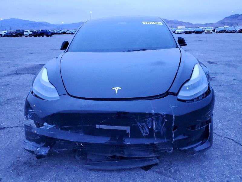 Photo 5 from auction – 2023 TESLA MODEL 3 with VIN 5YJ3E1EA1PF543343