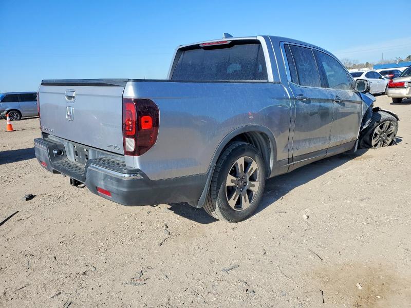 Photo 3 from auction – 2017 HONDA RIDGELINE with VIN 5FPYK3F63HB031631