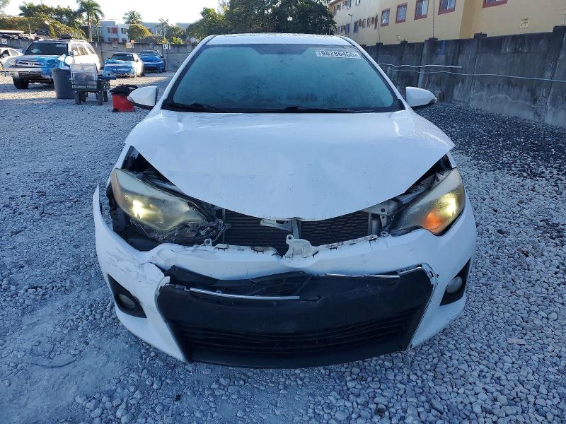 Photo 5 from auction – 2014 TOYOTA COROLLA L with VIN 2T1BURHE3EC041964