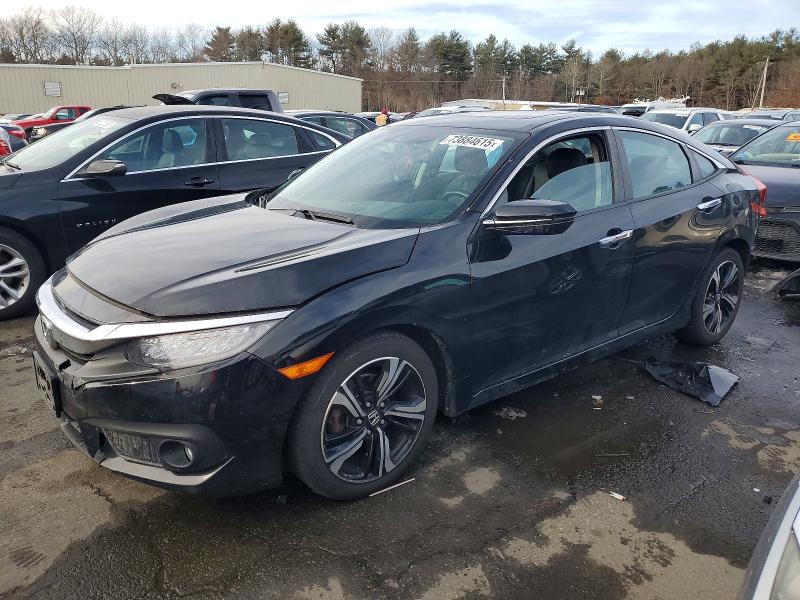 HONDA CIVIC TOUR 2016 with VIN 19XFC1F94GE220059 - Photo from auction