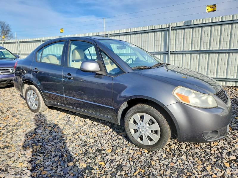 Photo 4 from auction – 2010 SUZUKI SX4 LE with VIN JS2YC5A21A6303588