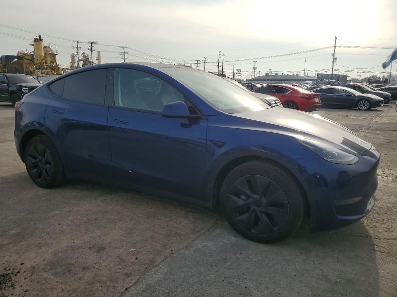 Photo 4 from auction – 2025 TESLA MODEL Y with VIN 7SAYGDED7SF231356