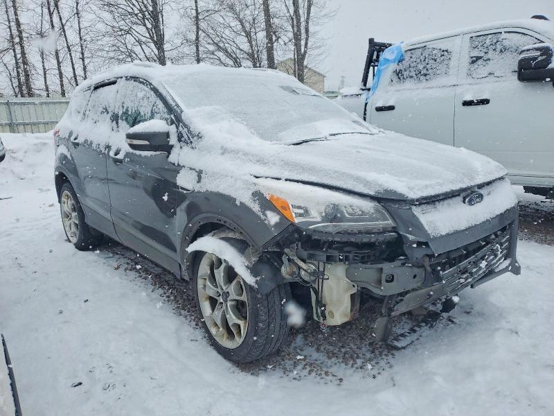 Photo 4 from auction – 2016 FORD ESCAPE TIT with VIN 1FMCU9J98GUA80147
