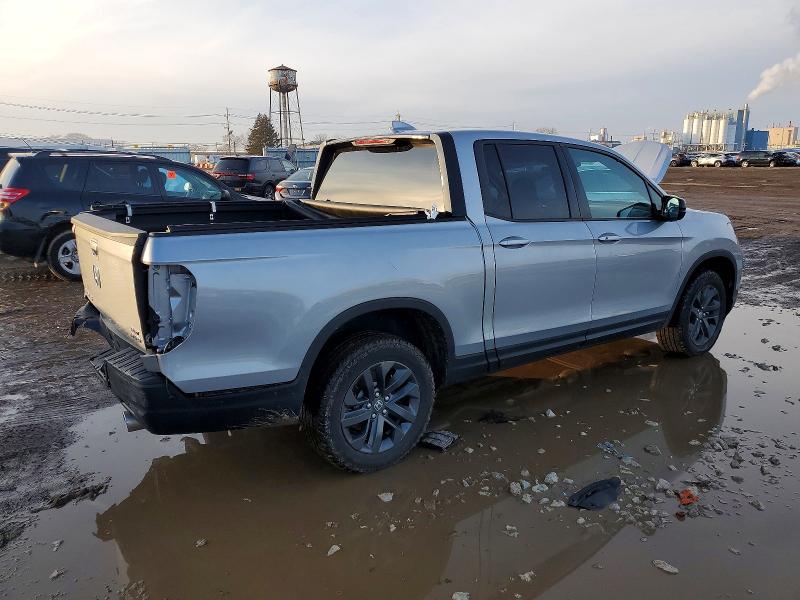 Photo 3 from auction – 2023 HONDA RIDGELINE with VIN 5FPYK3F1XPB040443