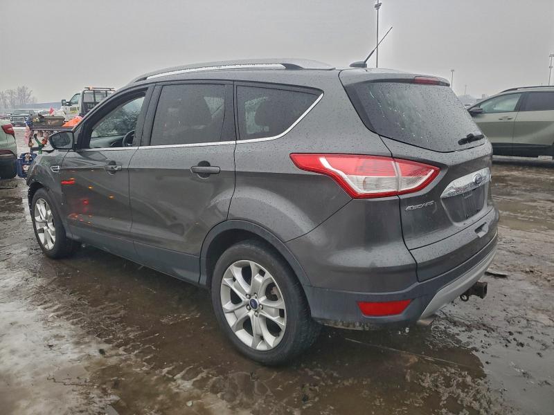Photo 2 from auction – 2016 FORD ESCAPE TIT with VIN 1FMCU0J99GUB56387