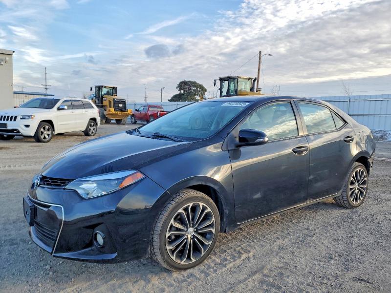 TOYOTA COROLLA L 2014 con VIN 5YFBURHE5EP154556 - Foto de la subasta