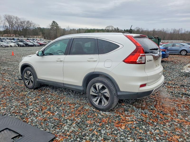 Photo 2 from auction – 2015 HONDA CR-V TOURI with VIN 5J6RM3H99FL014240