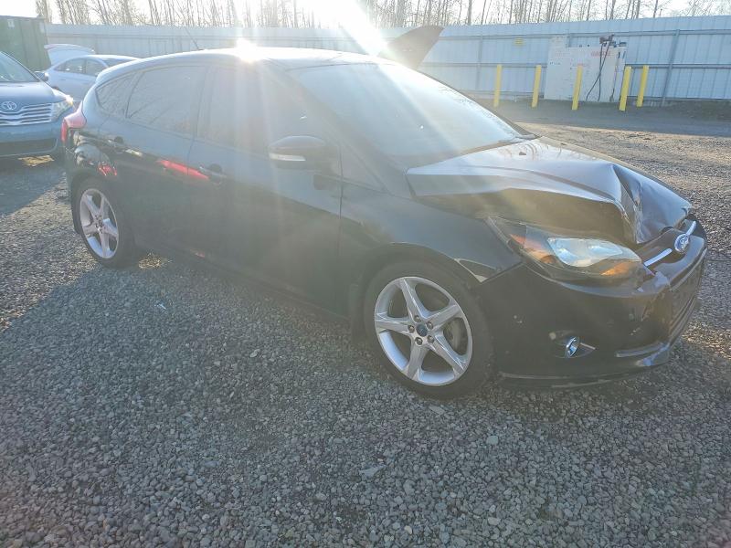 Photo 4 from auction – 2012 FORD FOCUS TITA with VIN 1FAHP3N28CL321769
