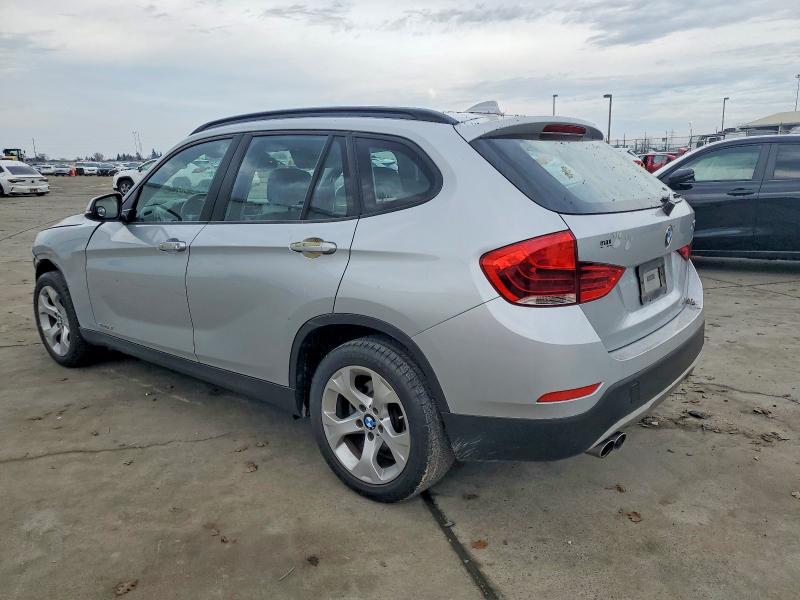 Photo 2 from auction – 2013 BMW X1 SDRIVE2 with VIN WBAVM1C54DVW41293