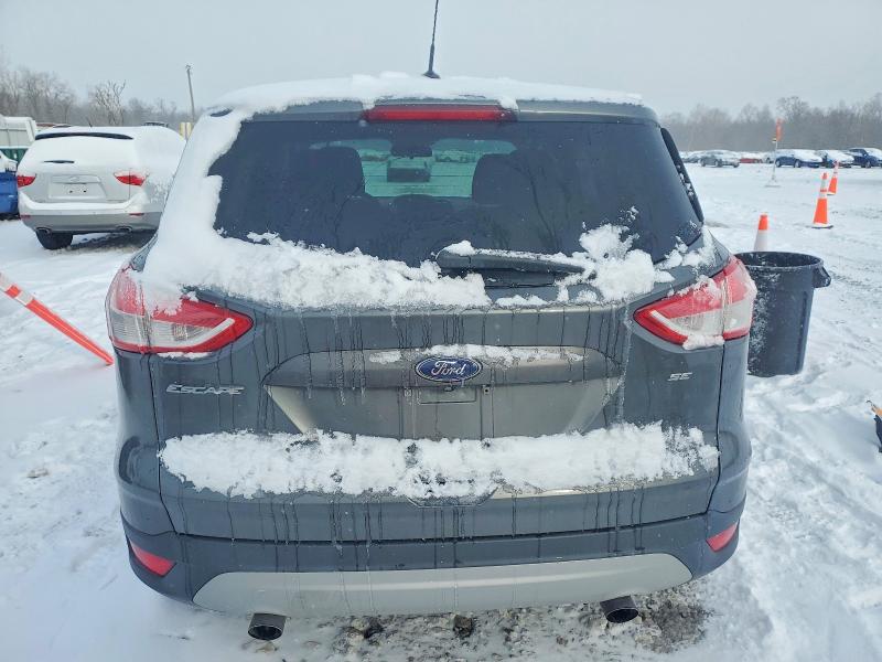 Photo 6 from auction – 2016 FORD ESCAPE SE with VIN 1FMCU0G7XGUB87038