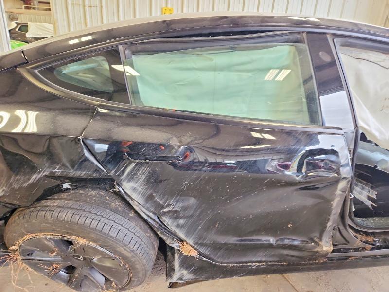 Photo 10 from auction – 2023 TESLA MODEL 3 with VIN 5YJ3E1EA4PF702811