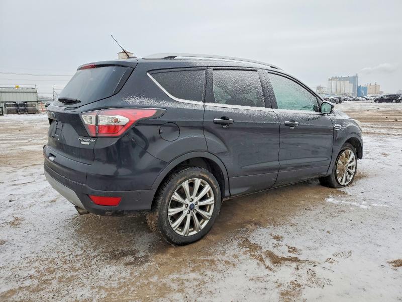 Photo 3 from auction – 2017 FORD ESCAPE TIT with VIN 1FMCU0JD1HUA48772