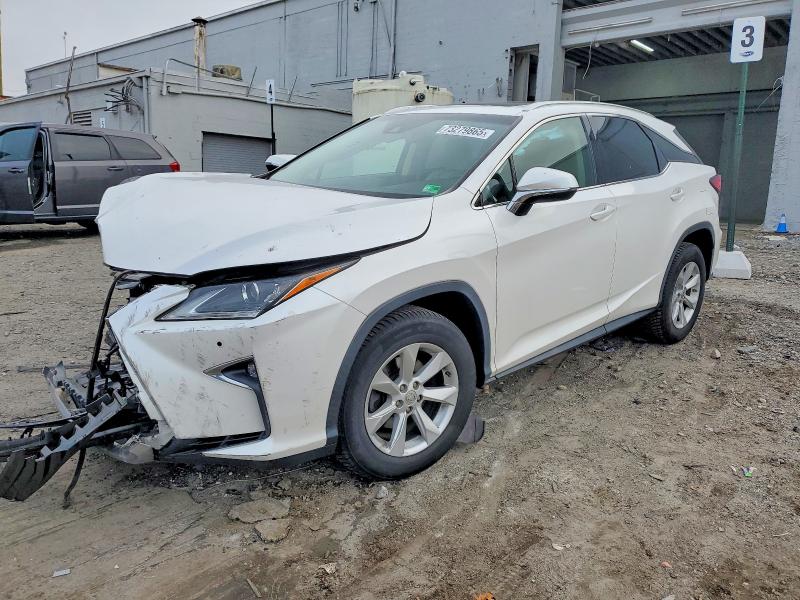 LEXUS RX 2017 with VIN 2T2BZMCAXHC121996 - Photo from auction