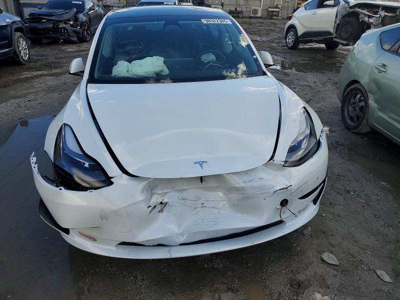 Photo 5 from auction – 2023 TESLA MODEL 3 with VIN 5YJ3E1EAXPF674996