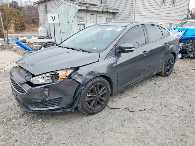 FORD FOCUS SE 2017 with VIN 1FADP3F24HL315665 - Photo from auction