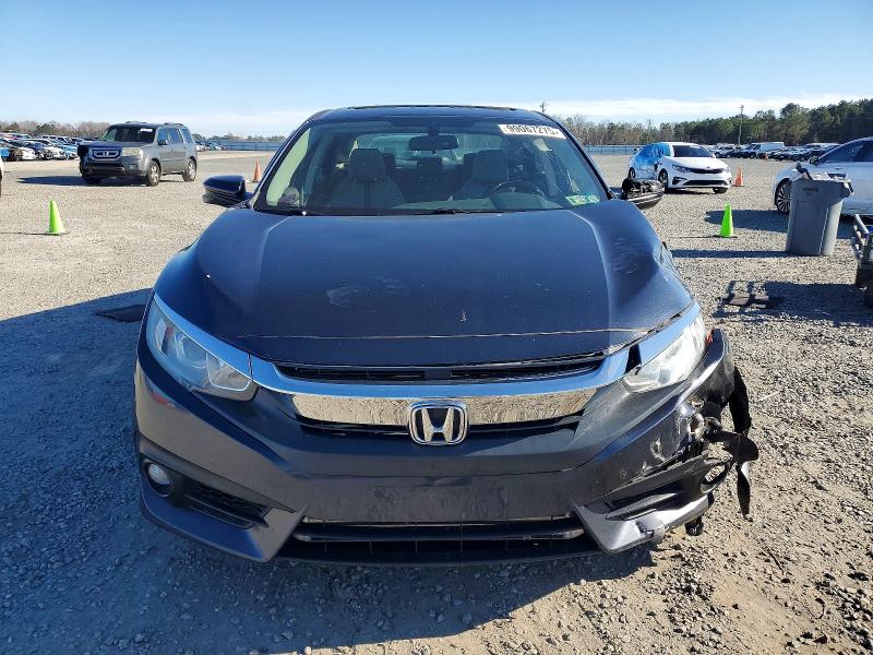 Photo 5 from auction – 2017 HONDA CIVIC EX with VIN 19XFC1E35HE027627