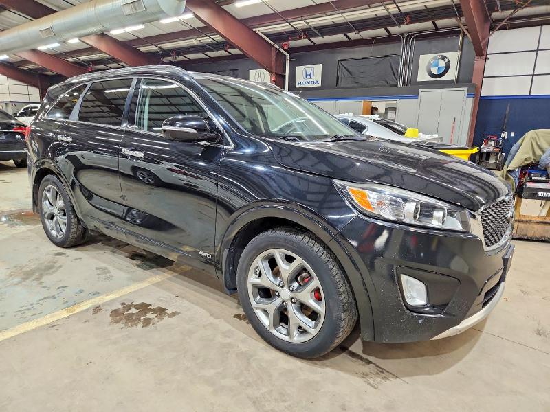 Photo 4 from auction – 2016 KIA SORENTO SX with VIN 5XYPKDA54GG154600