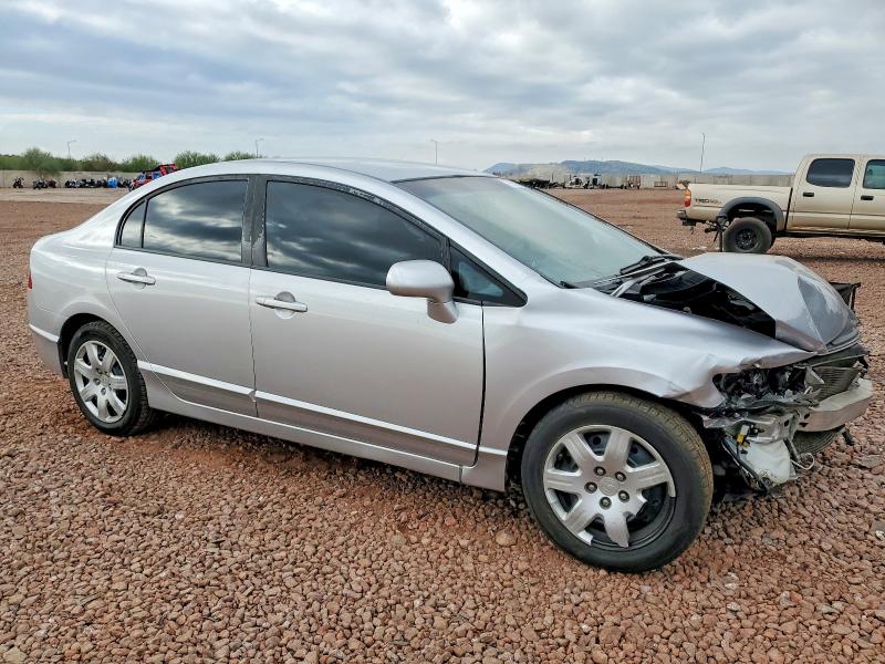 Photo 4 from auction – 2010 HONDA CIVIC LX with VIN 19XFA1F55AE068576