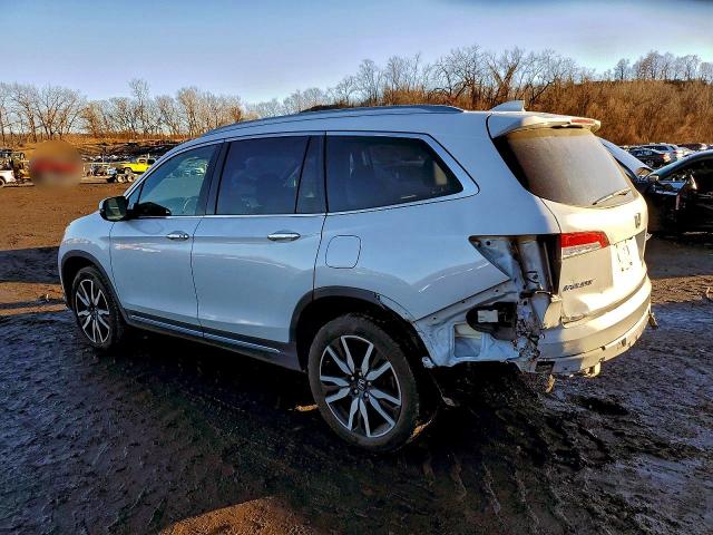 Photo 2 from auction – 2021 HONDA PILOT TOUR with VIN 5FNYF6H96MB070536